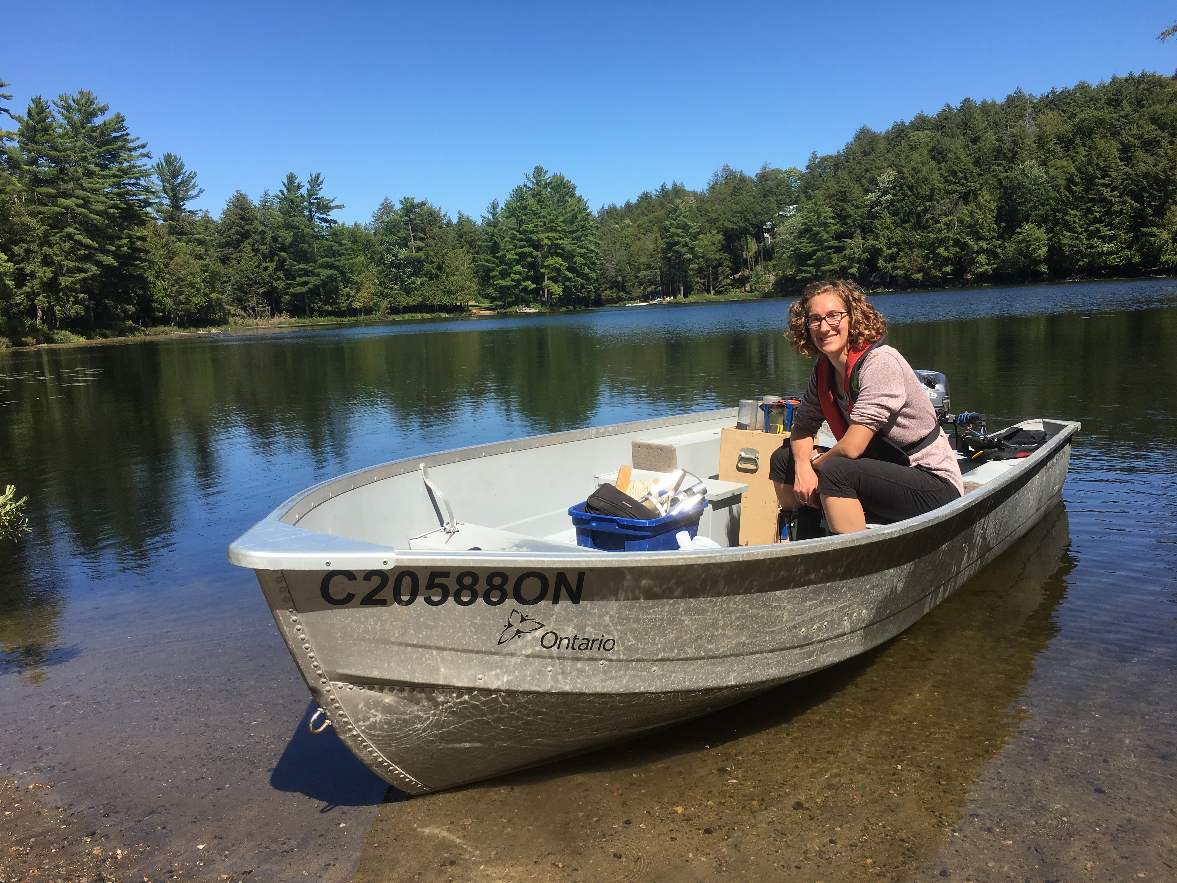 Brittany sitting on a boat