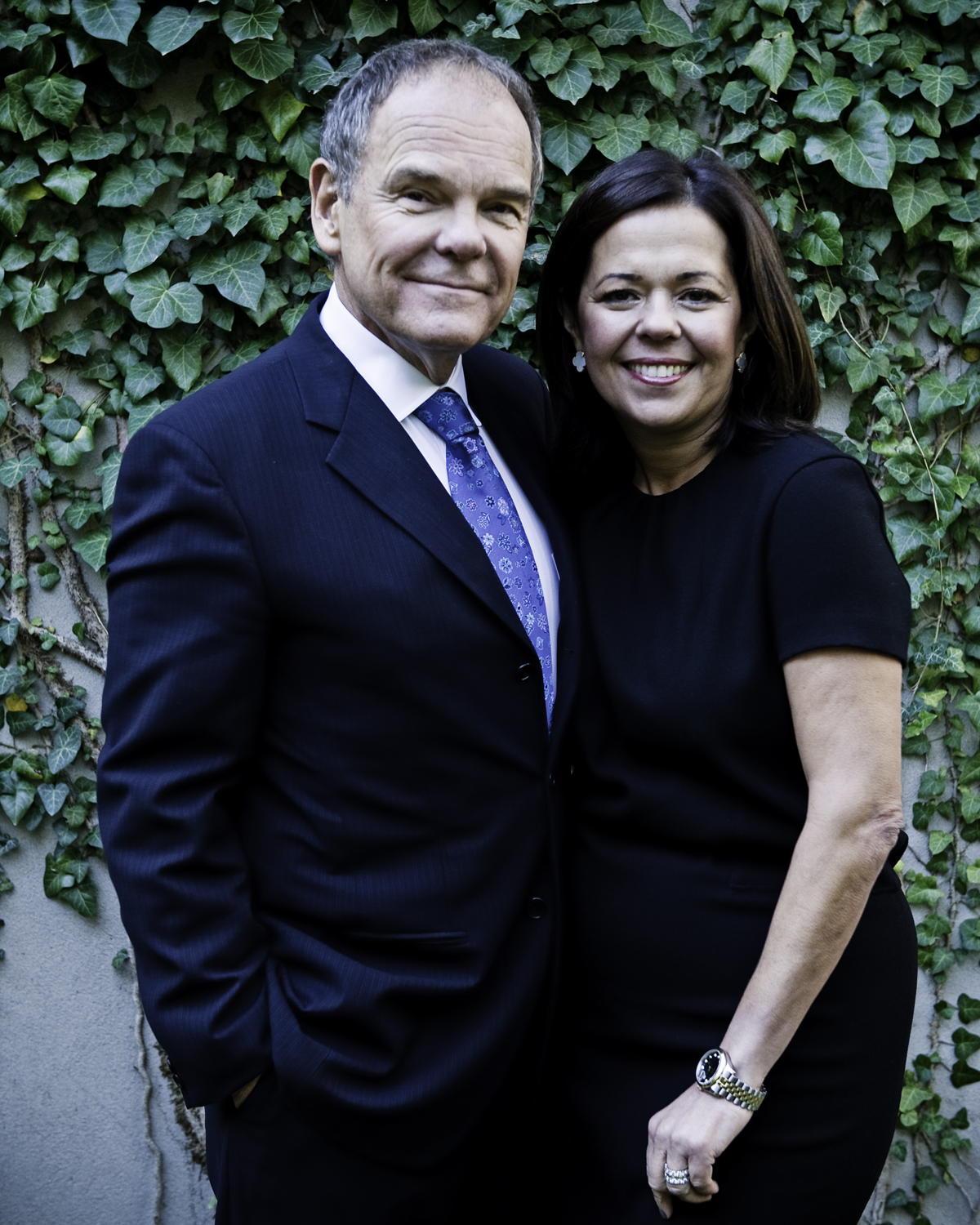 Dr. Don Tapscott in a black suit and Dr. Ana P. Lopes in a black dress