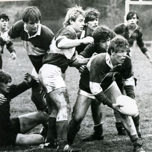 Black and white image of rugby players