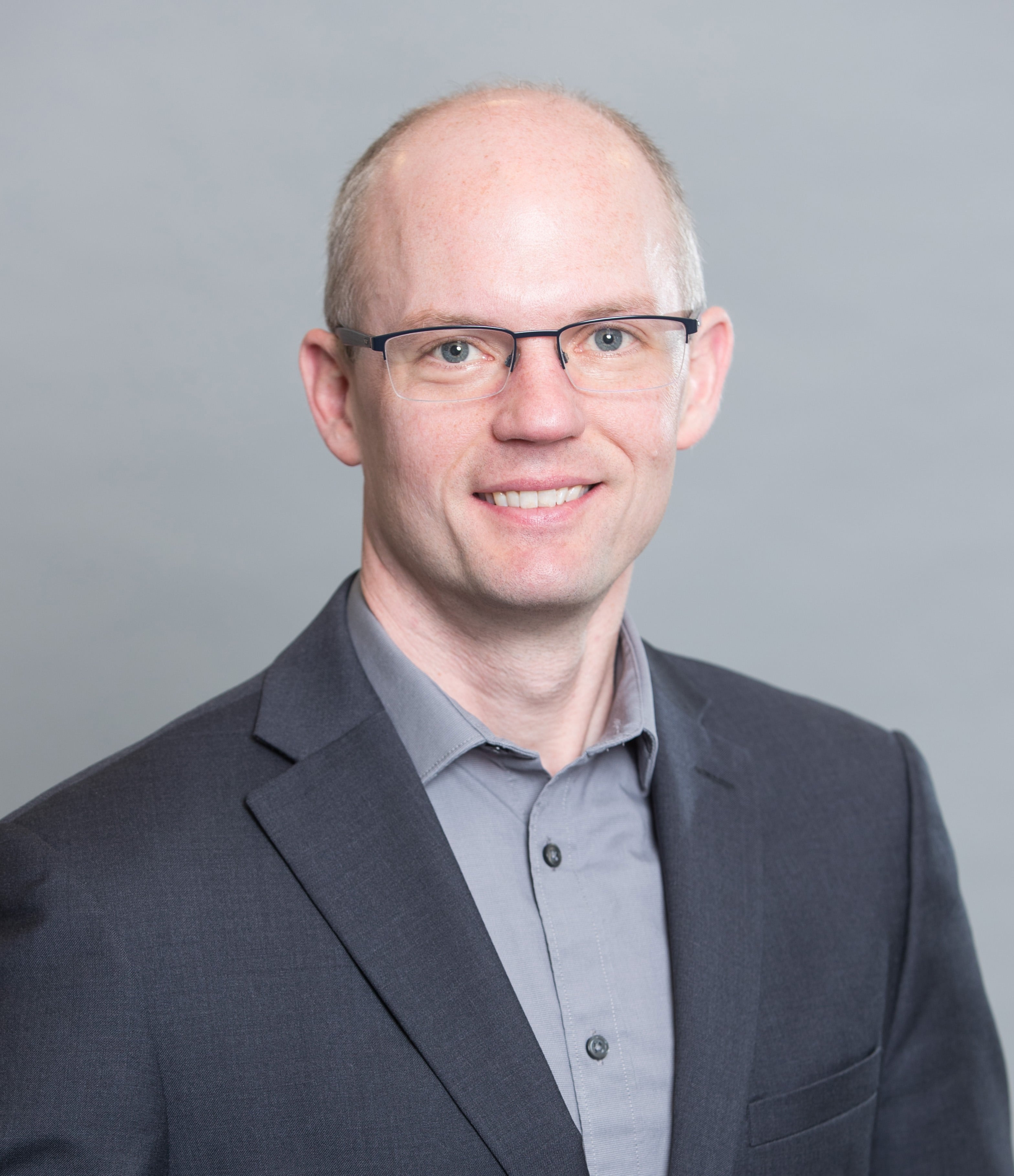 A headshot of Trevor Tombe