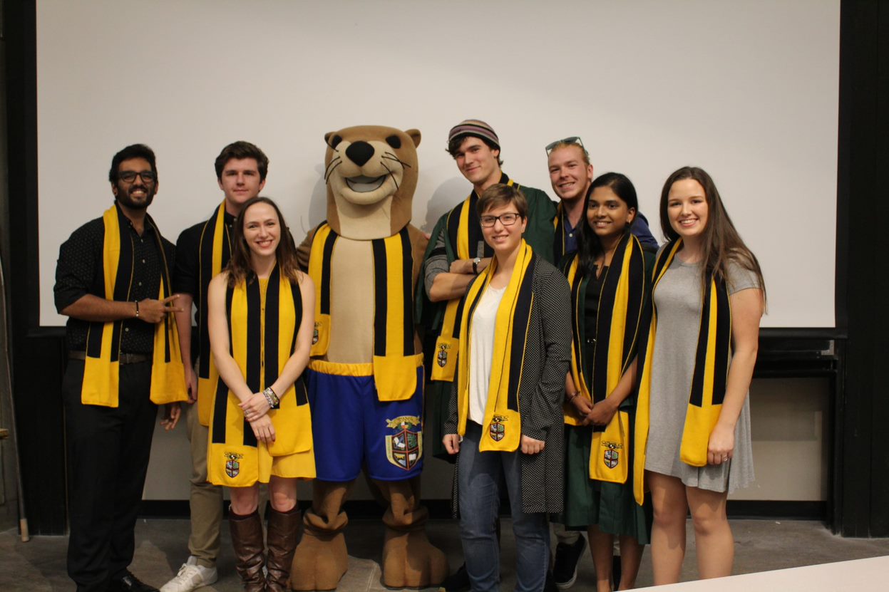 OC students with scarf and a mascot